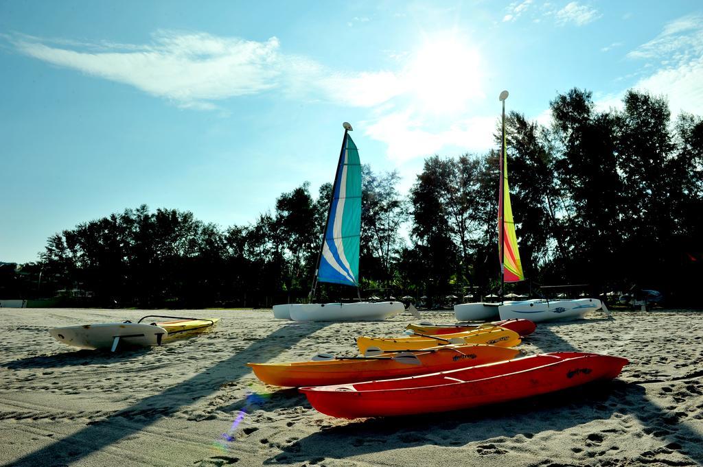 Tanjung Rhu Resort Langkawi Exterior photo Kayaks and sailboats on the beach at Lake Nokomis